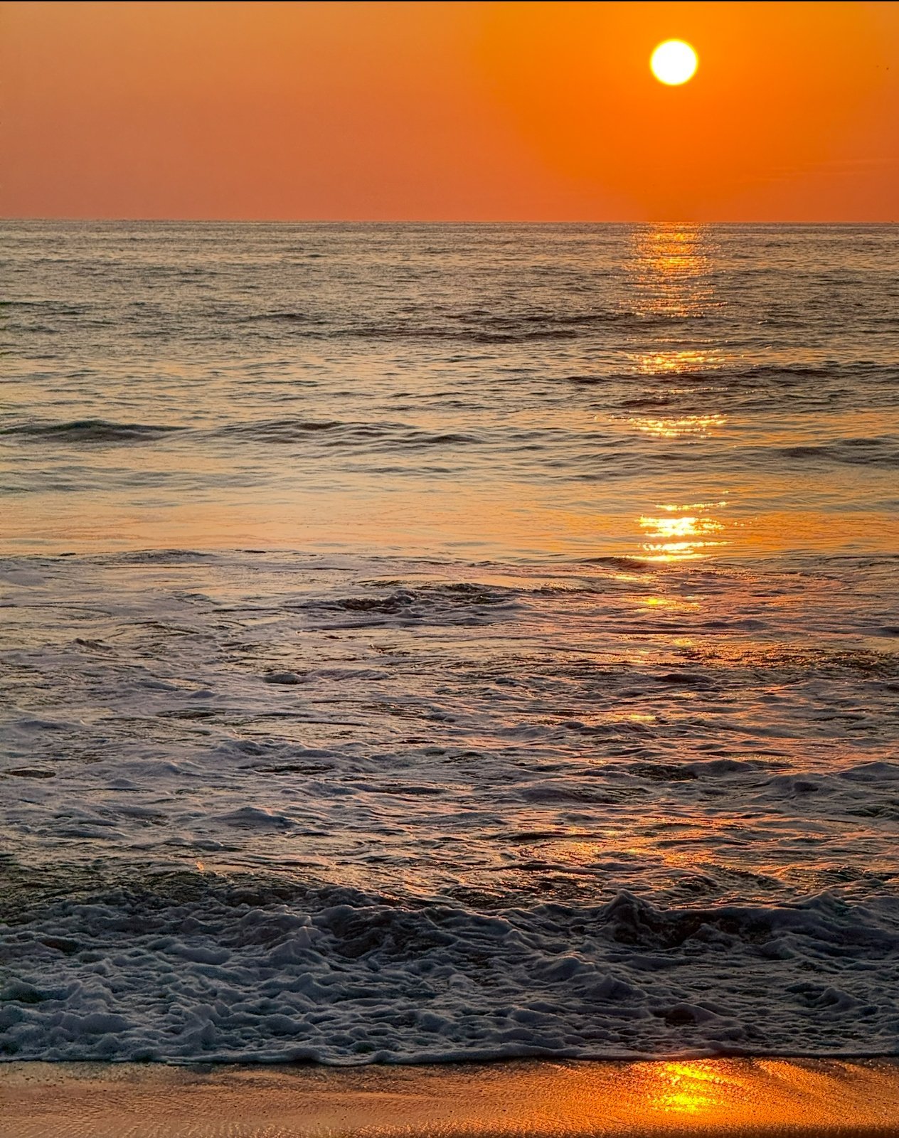 Sunset over the water